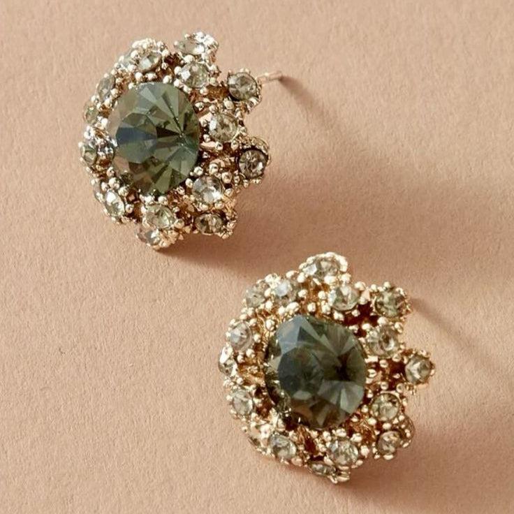 緑色の光沢のある丸いヴィンテージピアス