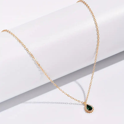 金色のエメラルドのティアドロップネックレス