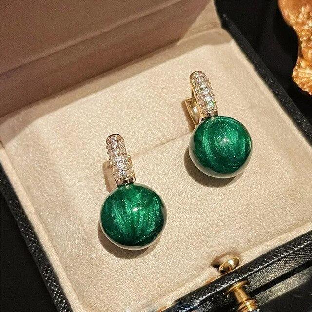 金色のグリーンパールイヤリング