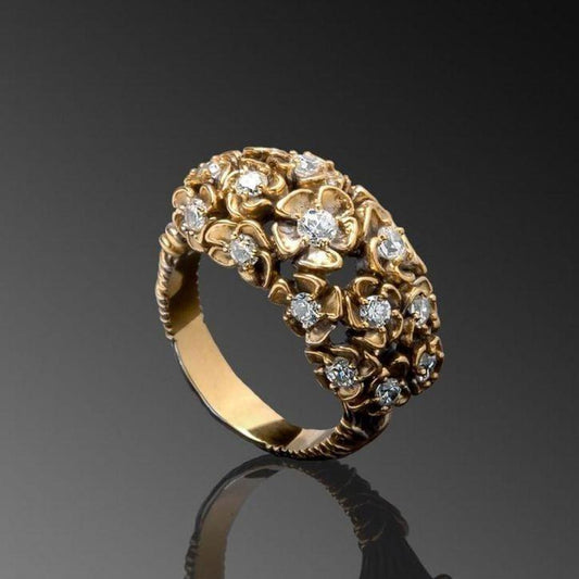 花のついた金色の輝くリング